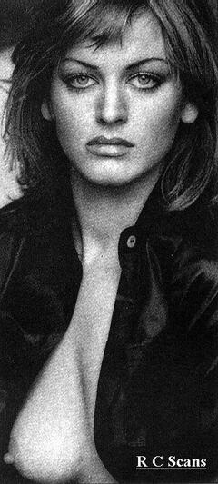 Dalila Di Lazzaro flashing her nude tit