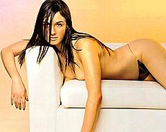 Paz Vega lying topless