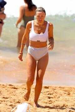 Claire Greaves in white bikini on a  beach in Sydney - January 2025
