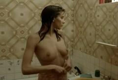 Charlotte Kid topless in a bathroom at La bande du Rex