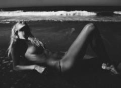 Bryden Jenkins lying topless on a beach black-&-white image
