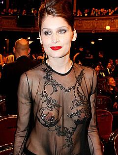 Laetitia Casta nude boobs under see through dress at 35th Cesar Film Awards In Paris