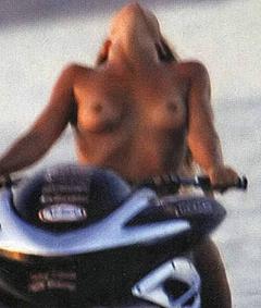 Guendalina Canessa topless at water jet scooter