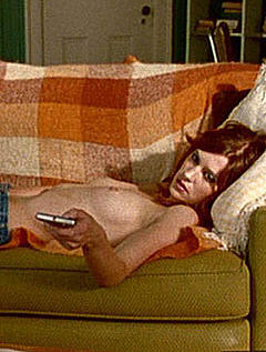 Lauren Lee Smith topless on a bed in Lie with Me